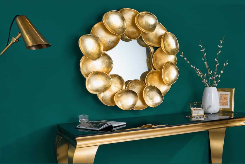 Dekorativer Design Spiegel CASCARA 73cm gold Metall Handarbeit